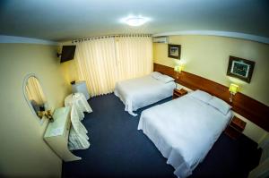 Postel nebo postele na pokoji v ubytování Gran Bolivar Hotel - Trujillo, Perú + 26 fotografií