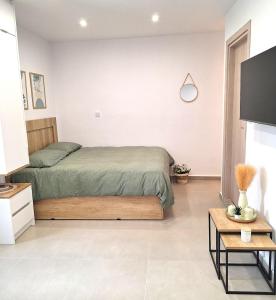 Postel nebo postele na pokoji v ubytování LV Home Lasithi