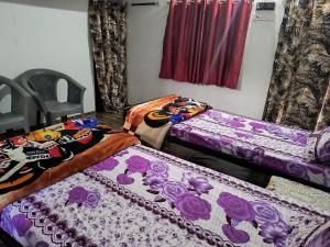 Khajuraho Dreams Homestayにあるベッド