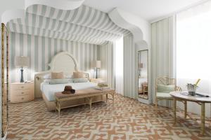 Postel nebo postele na pokoji v ubytování Hotel Excelsior Venice
