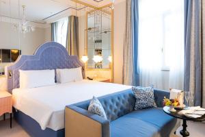 Postel nebo postele na pokoji v ubytování Hotel Excelsior Venice