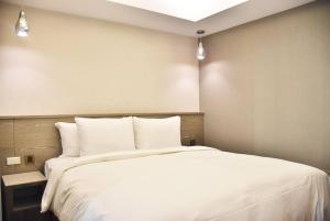 Postel nebo postele na pokoji v ubytování Innk