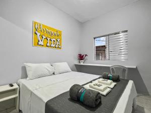 Postel nebo postele na pokoji v ubytování Plaza Shopping Coworking Fully Equipped