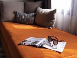 Postel nebo postele na pokoji v ubytování Novotel Paris Suresnes Longchamp