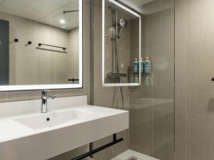 Koupelna v ubytování Novotel Paris Suresnes Longchamp