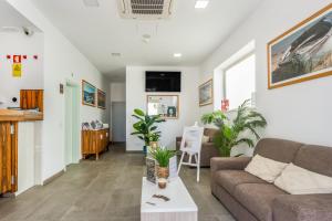 Телевизор и/или развлекательный центр в Hotel Rural Brícia Du Mar