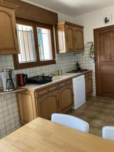 Kuchnia lub aneks kuchenny w obiekcie Le jardin suspendu