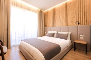 Krevet ili kreveti u jedinici u okviru objekta Hotel Apollon Sarande +37 fotografija