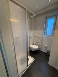 Koupelna v ubytování Ferienwohnung Holzteichstraße 12 + 10 fotografií