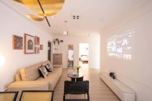 Posezení v ubytování Shanghai Yi Du B&B - Family Suite located 500 meters away from Nanjing West Road Subway and near People's Square