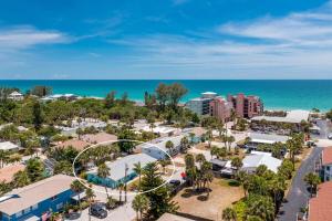 an aerial view of a resort with the ocean at Seaglass Inn in Englewood