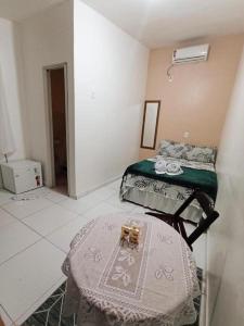 Ліжко або ліжка в номері Pousada Maceió é Massa