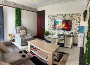 Posezení v ubytování Dynamic Fully Furnished Apartments in Nairobi, 14 km from Jomo Kenyatta International Airport and the SGR