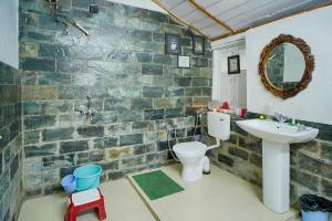 Vannituba majutusasutuses Leela Cottages