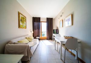 TV a/nebo společenská místnost v ubytování Bed and Breakfast Studios Alto lago di Como