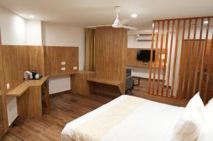 Kuchyň nebo kuchyňský kout v ubytování Oasis Suites