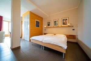 Postel nebo postele na pokoji v ubytování Bed and Breakfast Studios Alto lago di Como