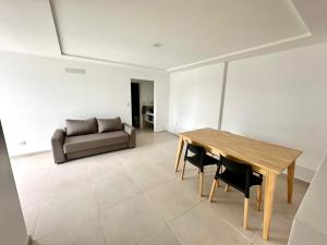 Et opholdsområde på Alojamiento entero para 4 personas F + 5 billeder