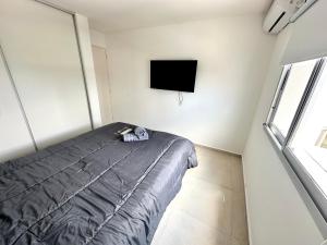 Et tv og/eller underholdning på Alojamiento entero para 4 personas F