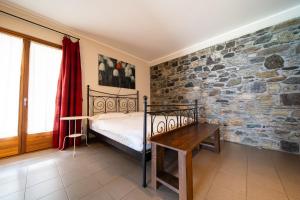 Postel nebo postele na pokoji v ubytování Bed and Breakfast Studios Alto lago di Como