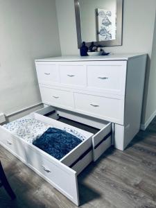 a white dresser with a drawer in a room at Beach Front at Ft Myers Beach in Fort Myers Beach +10 photos