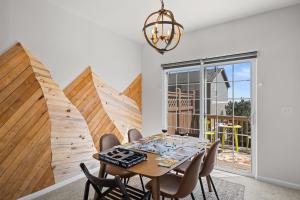a dining room with a table and chairs at USAFA 5mi I Modern I Arcade I Quiet Area in Monument