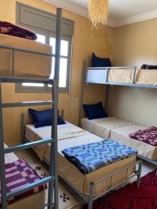 Krevet ili kreveti u jedinici u okviru objekta Mirleft Hostel