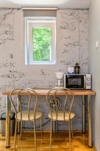 Kuchyň nebo kuchyňský kout v ubytování Studio Modern Centru