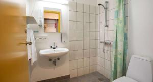 A bathroom at Hotel Dalgas, BW Signature Collection