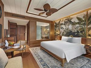 Postel nebo postele na pokoji v ubytování Mövenpick Resort Phan Thiet