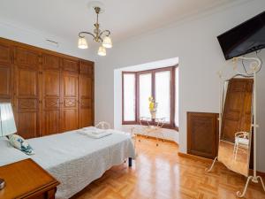 Postel nebo postele na pokoji v ubytování Cubo's Villa Fina & Minigolf included