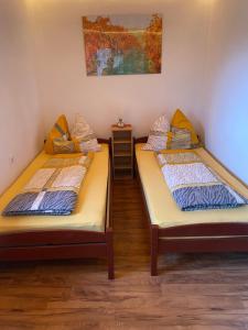 Postel nebo postele na pokoji v ubytování Ferienhaus Kuckucksnest