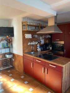 Kuchyň nebo kuchyňský kout v ubytování Ferienhaus Kuckucksnest