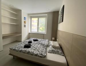 Posteľ alebo postele v izbe v ubytovaní Comfortable apartment in Brno
