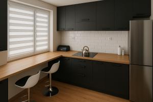 Köök või kööginurk majutusasutuses Przytulny apartament w wieżowcu - Centrum miasta Podwisłocze 38