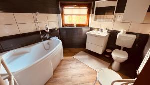 Kúpeľňa v ubytovaní Strigonia Apartman