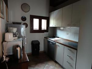 Kuchyňa alebo kuchynka v ubytovaní Chalet Carlines - Grand appartement années 70 ! Dans chalet sans parking MAE-3814 + 12 fotografií