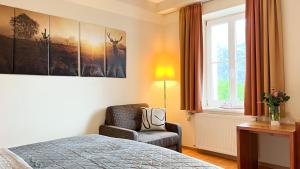Voodi või voodid majutusasutuse Gästezimmer Karolina toas