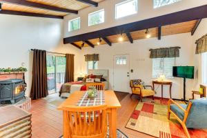 a large living room with a bed and a fireplace at Hidden Valley Retreat - Outdoorsy West Point Gem in West Point