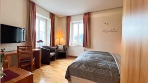Voodi või voodid majutusasutuse Gästezimmer Karolina toas