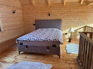 Postel nebo postele na pokoji v ubytování Driftwood Dreams + 12 fotografií