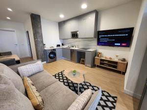 Ruang duduk di Playa B - PRIMERA LINEA DE PLAYA - WIFI GRATIS