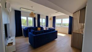 Χώρος καθιστικού στο Apartamenty Róża Wiatrów 45B z dużym tarasem