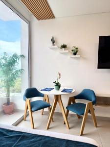 Posezení v ubytování Lujosa Apartasuite en Santa Marta