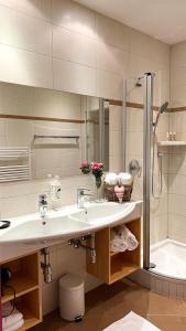 Vannituba majutusasutuses Gästezimmer Karolina