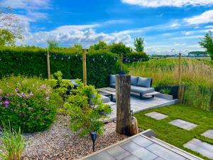 Κήπος έξω από το Premium-Strand Chalet an der Nordsee - Noordzee - Zeeland