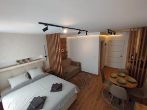 Postel nebo postele na pokoji v ubytování A2 Silver