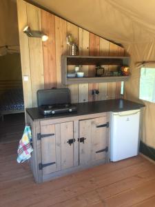 Kuchyň nebo kuchyňský kout v ubytování SafariLodge 6 persoons