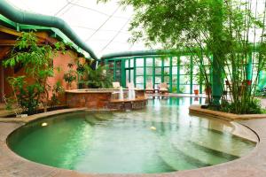 a large pool of water in a building at El Monte Sagrado Resort & Spa in Taos