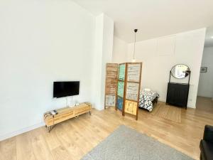 Telewizja i/lub zestaw kina domowego w obiekcie Aluche Aparment B